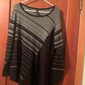 Cute sweater. Longer length to wear with leggings.